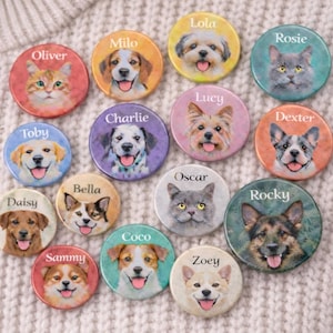 May include: A selection of circular pet portrait badges, each displaying a different dog or cat's face and name, including "Oliver," "Milo," and "Rosie." The badges are arranged on a cream-coloured knitted background.