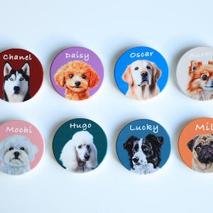 May include: Eight circular coasters, each displaying a different dog breed portrait. The coasters feature various background colours, such as red, purple, blue, and orange, with the dog's name printed above the image.