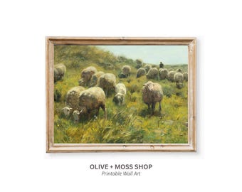 May include: A framed landscape painting depicting a flock of sheep grazing in a grassy field with yellow and green tones. A lone figure stands in the distance under a pale sky. The artwork is labeled OLIVE + MOSS SHOP Printable Wall Art below.