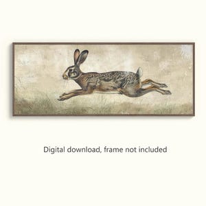 May include: A brown and white rabbit with long ears is running across a textured, beige background. The rabbit is in mid-air, with its legs extended and its tail tucked in. The background is a light beige with a subtle texture.