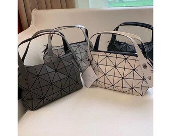 geometric casual dumpling bag with diamond pattern white silver milk tea Matte color for daily carry streetwear style