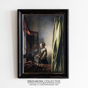 May include: A framed oil painting depicting a woman in a yellow dress sitting by a window, reading a letter. The painting is set in a room with a red curtain and a green curtain.
