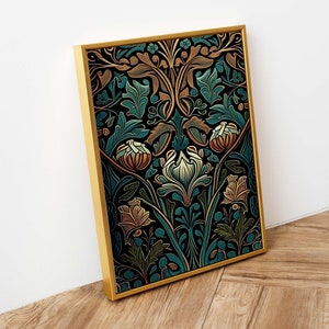 May include: A framed art print with a detailed floral design in teal, gold, and cream shades on a black backdrop. The artwork is encased in a gold frame, leaning against a white wall and wooden floor.