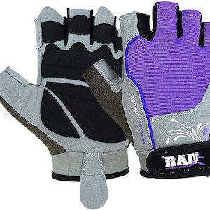 May include: A pair of fingerless gloves with a purple and gray design. The gloves have a floral pattern and the text "Woman's Power" and "RAD The Ultimate Strength" on them.