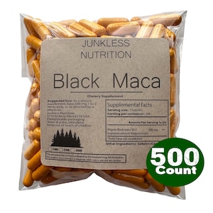 May include: A clear plastic bag filled with orange capsules. A brown label reads "Junkless Nutrition Black Maca" with supplement facts and usage instructions. A green circle indicates "500 Count".