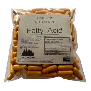 May include: A clear plastic bag filled with numerous orange capsules. A tan label on the front reads Junkless Nutrition Fatty Acid Dietary Supplement, listing 500 mg per serving, 200 servings per container, and other ingredients including gelatin.
