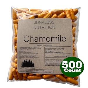 May include: A bag of yellow capsules, labelled "Chamomile" by Junkless Nutrition. The label includes supplement facts and a green circle indicating a 500-count package. The capsules are in a clear plastic bag.