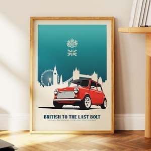 May include: A framed art print featuring a red Mini Cooper with the London skyline in the background. The print has a teal and beige color scheme, with the text "BRITISH TO THE LAST BOLT". The print includes the Union Jack and the text "INSTANTLY RECOGNISABLE. EFFORTLESSLY COOL. PURE MINI."
