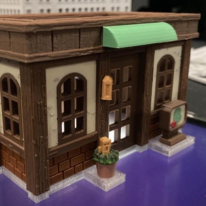 『あつまれ どうぶつの森』のルーストカフェ（3D プリントの建物）