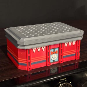 May include: A set of three ceramic mugs with a speckled, matte finish. The mugs are in shades of cream, light gray, and dark gray. Each mug has a simple, minimalist design, perfect for coffee or tea.