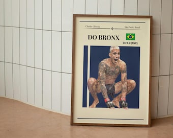 May include: A framed poster with a blue background featuring a man in a fighting stance. The poster has the text "DO BRONX" and "34-9-0 (1 NC)" in white. The man is wearing black shorts and red and black gloves. The poster also has the text "Charles Oliveira" and "Sao Paulo, Brazil" in white.