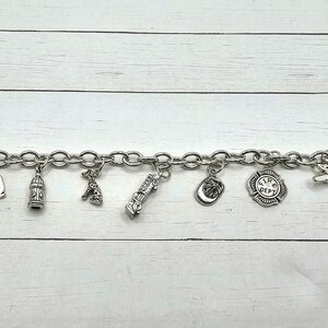 Bracciale con ciondolo pompiere in argento