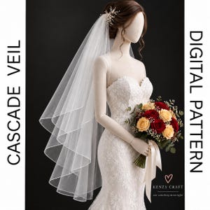 Puede incluir: Un velo en cascada blanco sobre un maniquí con vestido de novia de encaje, con un accesorio de perlas para el cabello y un ramo de rosas rojas y crema. El texto CASCADE VEIL y DIGITAL PATTERN es visible, junto con el logo KENZY CRAFT.