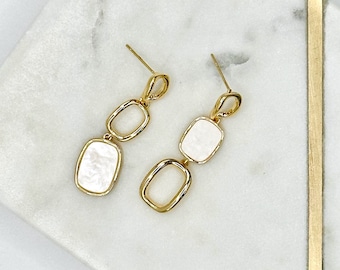 Vergulde niet-overeenkomende hangoorbellen, elegante geometrische sieraden