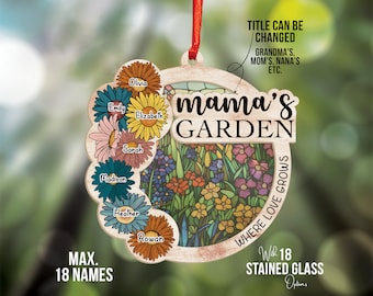 May include: A wooden ornament with a stained glass design of a garden. The ornament is shaped like a circle and has a red ribbon attached to the top. The text "mama's garden" is written on the ornament, along with the text "where love grows". The ornament is decorated with flowers and leaves. The text "max. 18 names" is written on the bottom of the ornament.