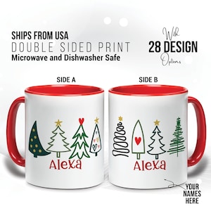 May include: A white ceramic mug with a red interior and handle, featuring Christmas tree designs and the name "Alexa" in red. The mug is double-sided and microwave and dishwasher safe.
