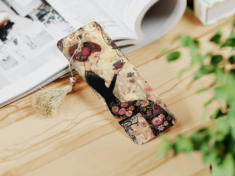 May include: A bookmark featuring a woman in a black dress with floral details, holding a teacup. The background is a watercolor-style painting with a vintage aesthetic.