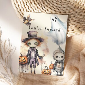 May include: A Halloween invitation card with a spooky cartoon illustration of a ghost, a bat, and two skeletons. The card says "You're Invited".