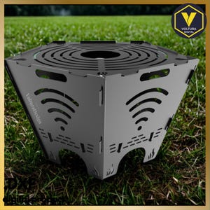 Puede incluir: Un brasero geométrico gris oscuro con una parte superior circular y símbolos wifi recortados en los lados. El brasero tiene un diseño único con el texto "VolturaDesign" y "DXF digitalorbox" visible.