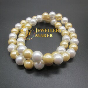 Radiant Harmony: Set of Two Golden & White Pearl Stretchable Beaded Bracelets - Handmade Jewelry, Christmas Gift