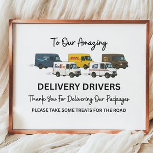 May include: A sign with a brown frame and white background that says "To Our Amazing Delivery Drivers Thank You For Delivering Our Packages Please Take Some Treats For The Road". The sign features illustrations of delivery trucks from FedEx, DHL, UPS, and Amazon.