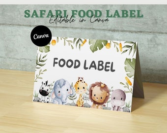 Può includere: Un'etichetta alimentare stampabile a tema giungla. L'etichetta presenta uno sfondo bianco con il testo "FOOD LABEL" in nero. L'etichetta è circondata da un bordo di foglie verdi con una varietà di animali della giungla, tra cui una zebra, un elefante, una giraffa, un leone e un ippopotamo.