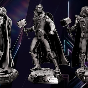 May include: A black and white figurine of Thor from the Marvel Cinematic Universe. The figurine is holding a hammer and is wearing a cape and armor. The figurine is standing on a base.