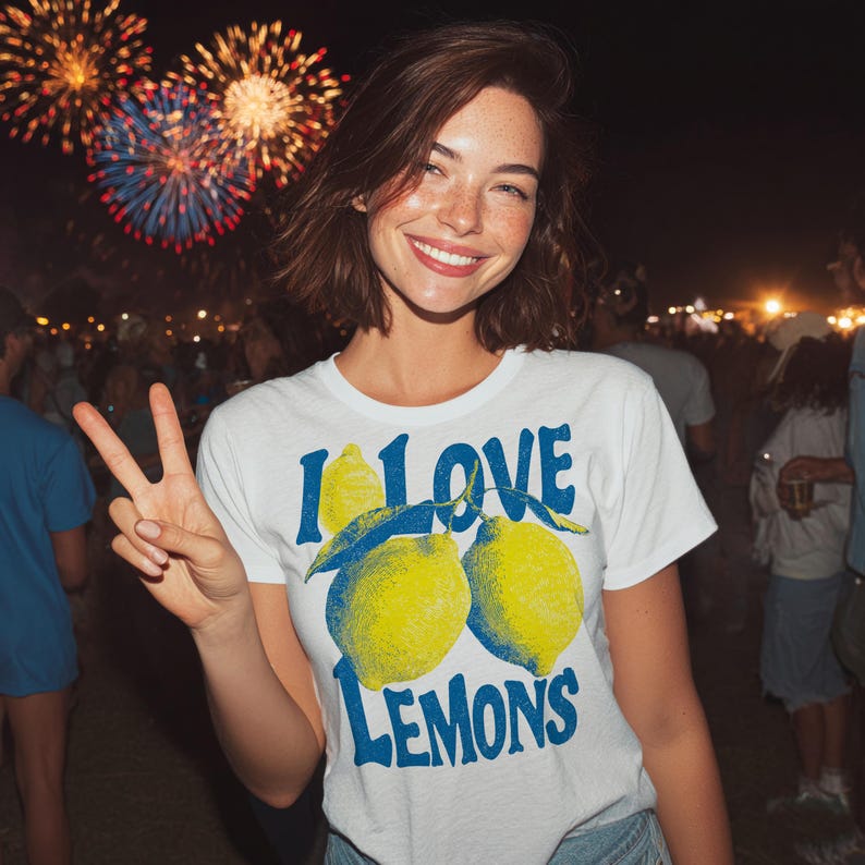 I Love Lemons t-shirt design featuring three hand-drawn yellow lemons with blue shading and bold retro blue text that says “I LOVE LEMONS.” A vibrant summer fruit graphic perfect for sublimation, printable t-shirts, summer merch, lemon-themed gifts, or wall art. Includes high-resolution PNG and PDF files for instant download. Ideal for fruit lovers, bold fashion, and sunny summer apparel. Gift for Her, gift for him.