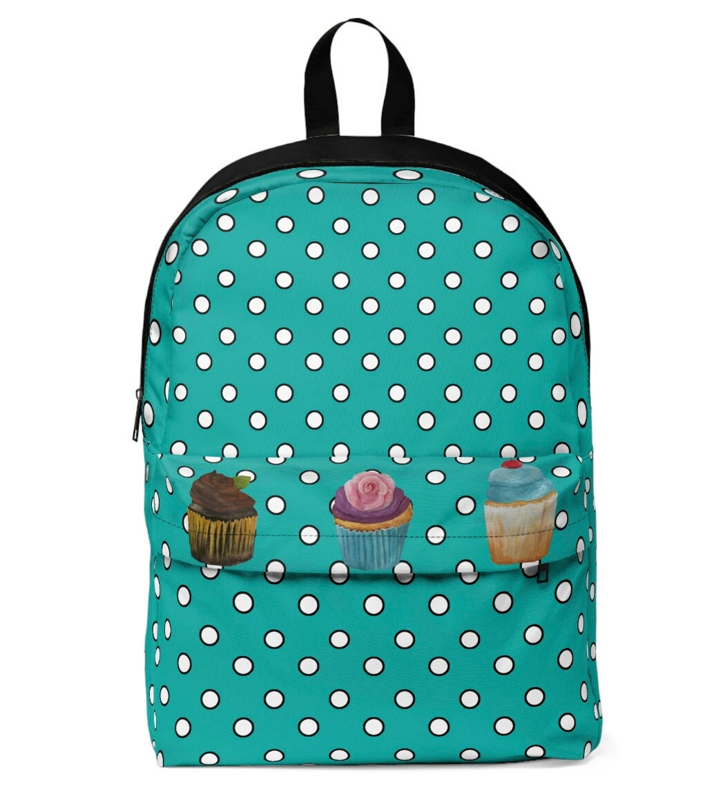 Blue polka dot backpack on sale