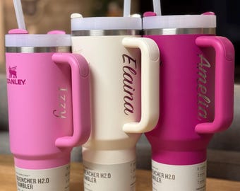 30oz or 40oz Stanley Tumbler with name laser engraved behind the handle.  Great discreet way to identify your Stanley!