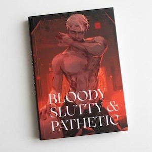 May include: A book with a red and black cover. It features an illustration of a shirtless person with light hair. The book's title, "BLOODY SLUTTY & PATHETIC," is printed in white. The background is a gradient of red.