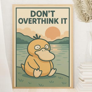 May include: A framed poster featuring a cartoon Psyduck character sitting by a lake with a sunset backdrop. The poster has the text "DON'T OVERTHINK IT" in green. The color palette includes shades of yellow, green, and orange.