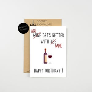 May include: A white birthday card with a brown envelope. The card features a wine bottle and a glass of red wine. Text on the card reads "Wine gets better with age" and "Happy Birthday!"