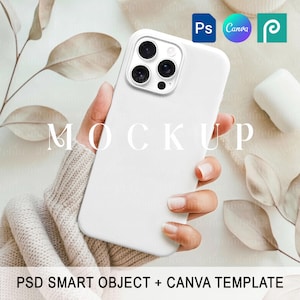 May include: A white smartphone case held in a hand, featuring a triple-lens camera cutout. The word "MOCKUP" is displayed on the phone. The bottom of the image reads "PSD SMART OBJECT + CANVA TEMPLATE".