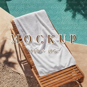 May include: A white towel lies on a wooden lounge chair by a swimming pool. The text "MOCKUP PSD + JPG" is printed on the towel.