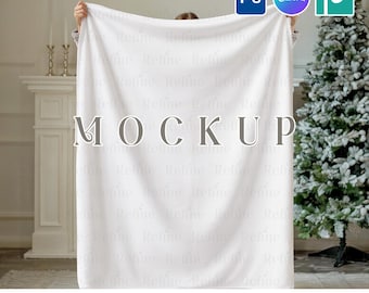 May include: A white blanket mockup held up in front of a person. The word "MOCKUP" is printed on the blanket. The image also includes the text "PSD SMART OBJECT + CANVA TEMPLATE" and logos for Photoshop, Canva, and a design platform.