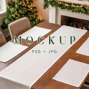 May include: A wooden table setting with a white table runner and matching placemats. The word "MOCKUP" is displayed in green text. The image is a mockup for product display.