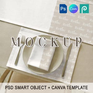 May include: A table setting mockup featuring a white napkin, plate, fork, and knife. The plate is set on a white placemat. The background includes a beige tablecloth and a patterned runner with the word "Refine". The word "MOCKUP" is overlaid on the image.