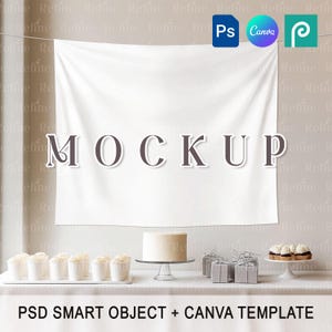 以下が含まれることがあります： 白い背景にグレーで「MOCKUP」と印刷されています。手前に白いテーブルがあり、白いケーキ、カップケーキ、ギフトボックスが置かれています。