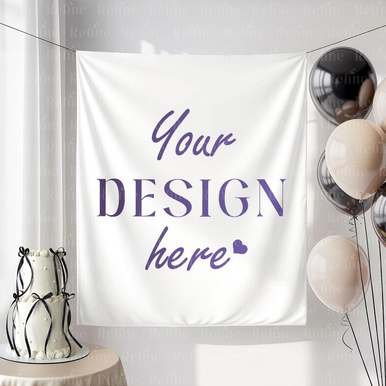 May include: A white banner with the text "Your DESIGN here" in purple, hanging in front of a white wall. A two-tiered cake with black ribbons and balloons are on the left and right sides of the banner.