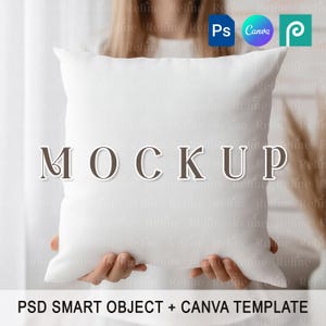 May include: A white square pillow held by a person. The word "MOCKUP" is printed on the pillow. The text "PSD SMART OBJECT + CANVA TEMPLATE" is at the bottom of the image. The image also contains the logos for Adobe Photoshop, Canva, and Placeit.