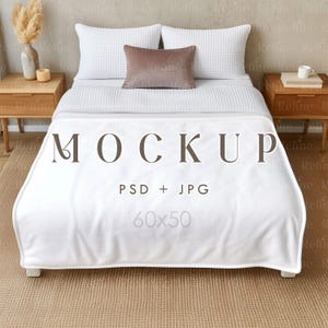 May include: A bed with white bedding, including pillows and a blanket. A brown pillow is on top of the bed. The blanket has the word "MOCKUP" printed on it, along with "PSD + JPG" and the dimensions "60x50". Two wooden nightstands are on either side of the bed.