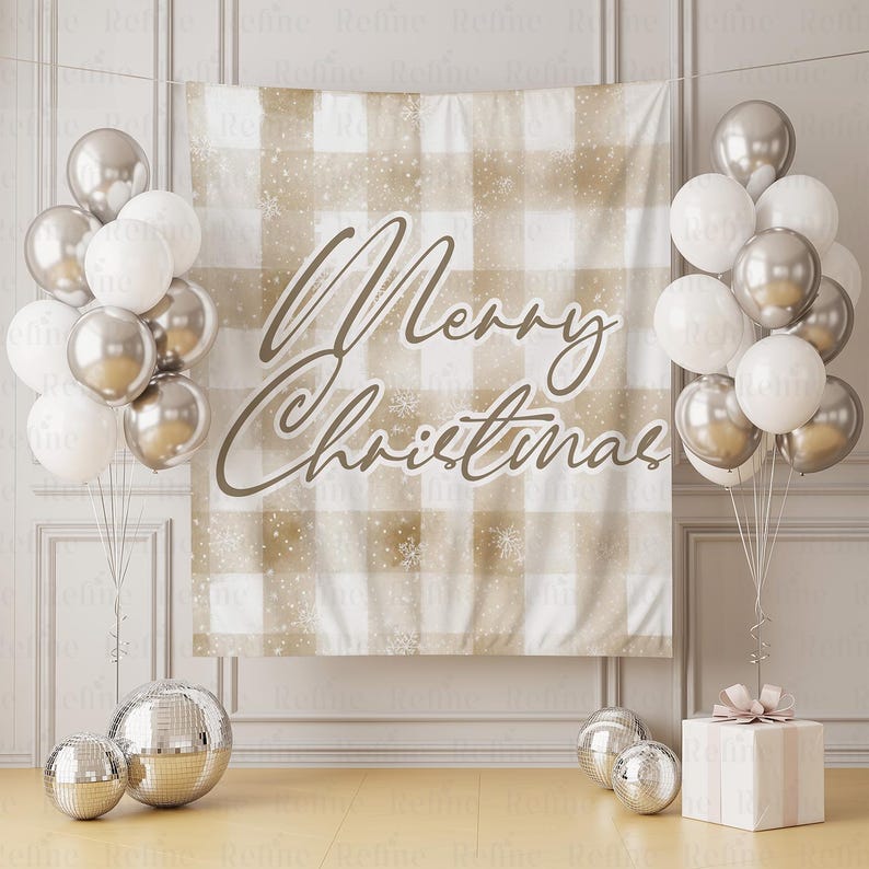 May include: A festive Christmas backdrop with a beige and white plaid pattern, adorned with the words "Merry Christmas" in elegant script. Silver and white balloons, disco balls, and a wrapped gift complete the holiday scene.