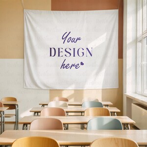May include: A white banner with the text "Your DESIGN here" in purple lettering hangs on a wall. The banner is displayed in a classroom setting, with rows of wooden desks and chairs visible in the foreground.