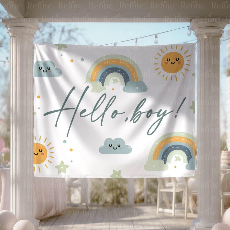 May include: A white banner with the text "Hello, boy!" in a script font. The banner features illustrations of rainbows, smiling suns, clouds, and stars in pastel colors, suitable for a baby shower or gender reveal.