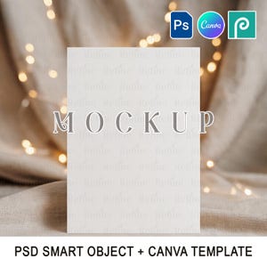 May include: A white rectangular mockup card with the word "MOCKUP" in a decorative font. The card is set against a neutral background with soft lighting and the text "PSD SMART OBJECT + CANVA TEMPLATE" at the bottom.