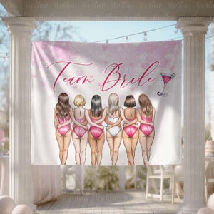 May include: A white banner with the words "Team Bride" in pink script, featuring an illustration of six women in swimsuits. The banner has a pink heart and splash design, and a cocktail illustration.