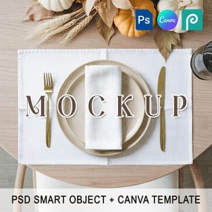 May include: A table setting mockup with a white placemat, beige plate, white napkin, and gold cutlery. The word "MOCKUP" is displayed on the plate. The image includes pumpkins, leaves, and the text "PSD SMART OBJECT + CANVA TEMPLATE".