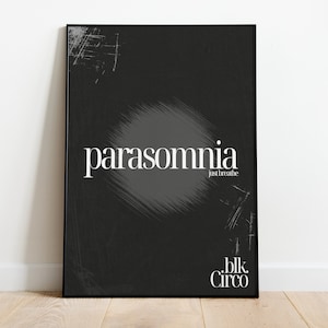 May include: Black and white poster with the word "parasomnia" in white text and the words "just breathe" in smaller white text. The poster has a gray, textured background and the text "blk. Circo" in white text at the bottom.