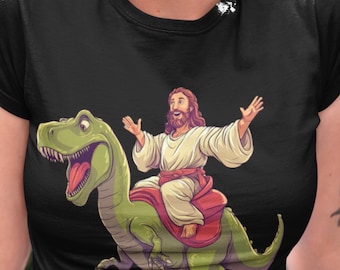 Jesus Riding Dinosaur Graphic T-Shirt: Funny Novelty Tee